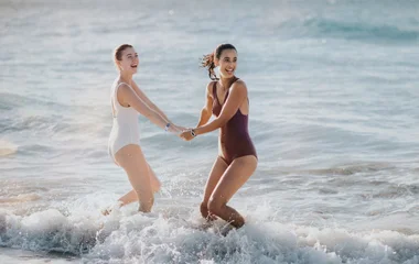 friends playing on beach