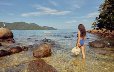 Mujer en la playa.