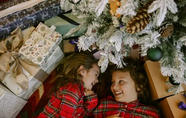 kids under Christmas tree