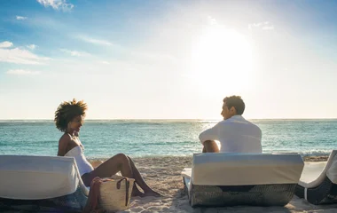 couple sitting on beach