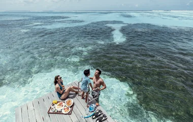 Family enjoying their holiday in the Maldives
