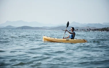 ixtapa mexico woman kayak sea
