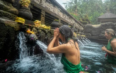 women in temple in bali