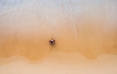 man sitting in the sea