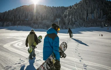 People snowboarding in winter