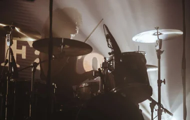 artist playing drums in club med