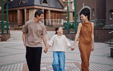 family walking in club med kiroro grand, hokkaido, japan