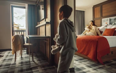 child and family in a room in club med