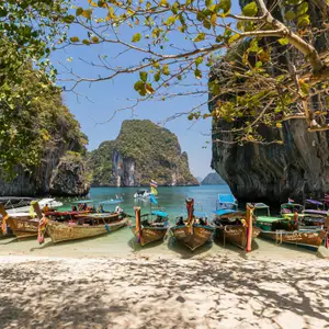 boats on the shore in thailand