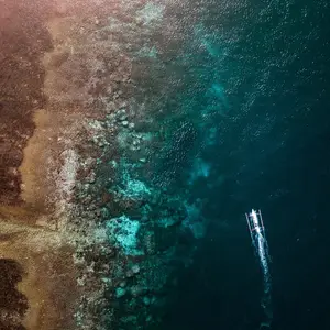 boat on clear water in indonesia