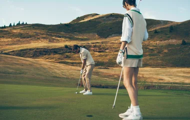 professeur de golf avec élève