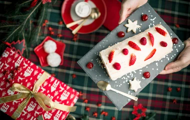 Christmas cookies in a festive bowl with candy canes