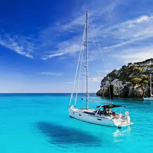 sailing boat on turquoise oceans
