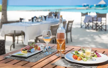 Breakfast time at a table on the beach