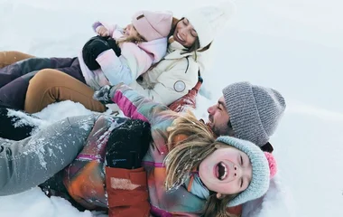 Family skiing in the Alps