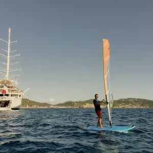 surfer walking to the ocean in the Maldives