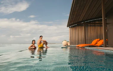 couple on holiday in a Maldives Villa