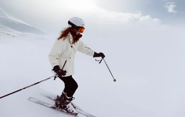 skier skiing down the slopes