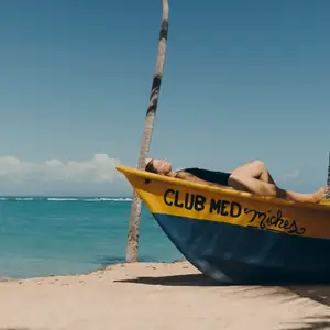 lying in the sun on holiday