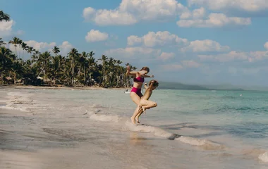 Family on the beach in the Caribbean