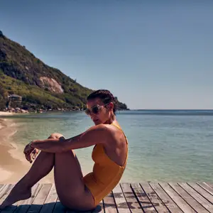 lady in the Seychelles on the beach