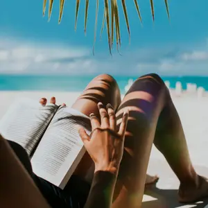 Reading on the beach in Turks and Caicos
