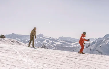 skiing with an instructor in the Alps