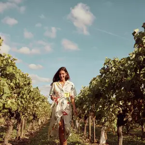 lady walking through French vinyards