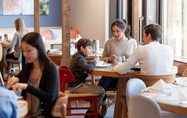 Family having lunch in a Japanese ski resort