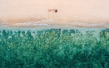 a beach in bali seen from above