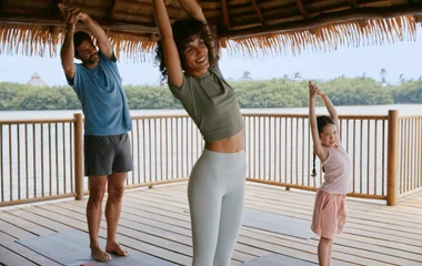 A family doing yoga