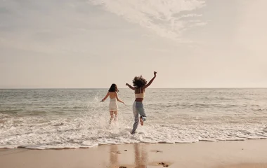running into the sea