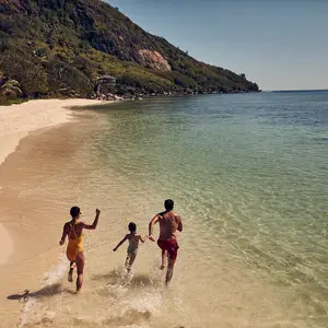 Seychelles beach with family