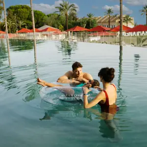 Family in the pool in Spain