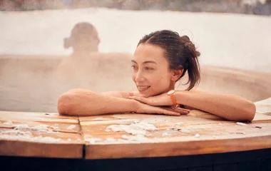 Women in a steaming outside jacuzzi