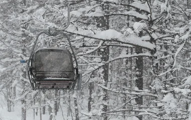 Gondola on a snowy forest