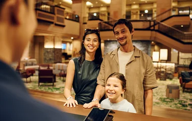 Family at ClubMed Kiroro Grand Resort reception.