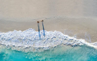Playa caribeña con aguas azul turquesa.